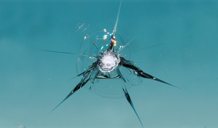 An example of windshield chip damage that can be repaired in Thompson, Manitoba